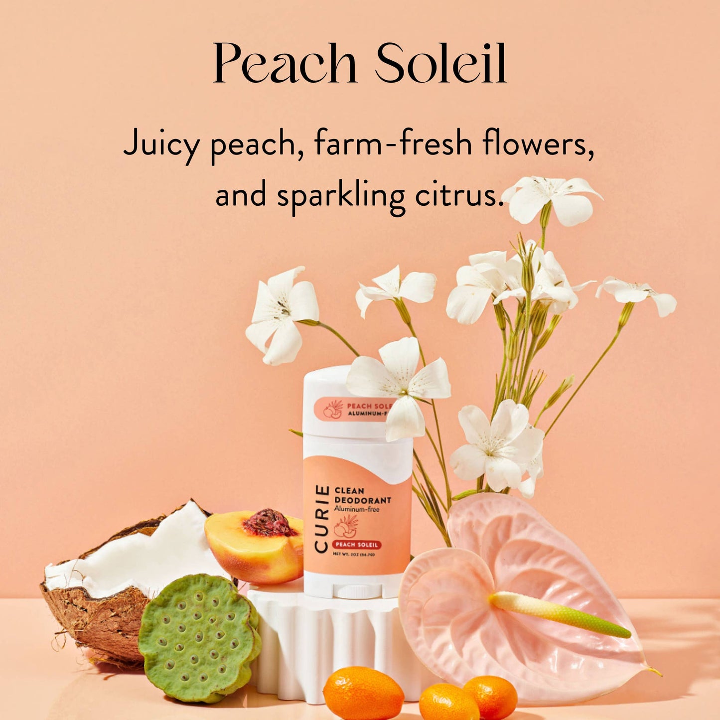 Clean Deodorant Aluminum-Free Peach Soleil surrounded by a peach, coconut, kumquats, lotus pod, and blooms, highlighting its juicy peach and citrus scent notes.