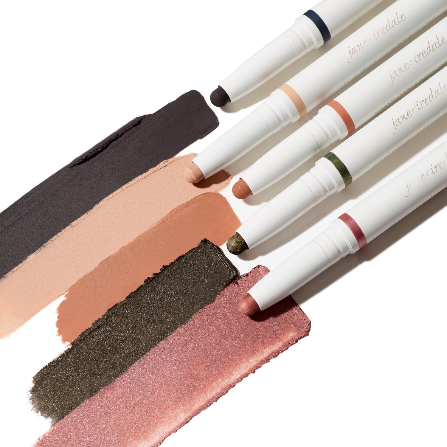 ColorLuxe Eye Shadow Stick set of five, showcasing creamy, blendable pigments with shades swiped on a white surface. Effortless, no-brush application for versatile eye looks.