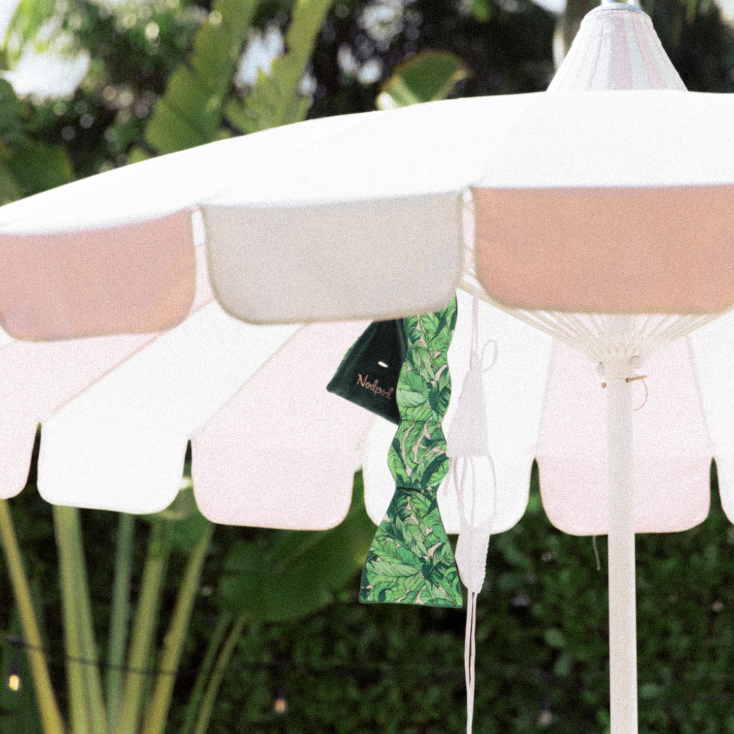 Weighted Blanket for your Eyes under parasol, featuring tropical and plain cloth pieces. Designed for calming pressure, dual comfort, and easy care.