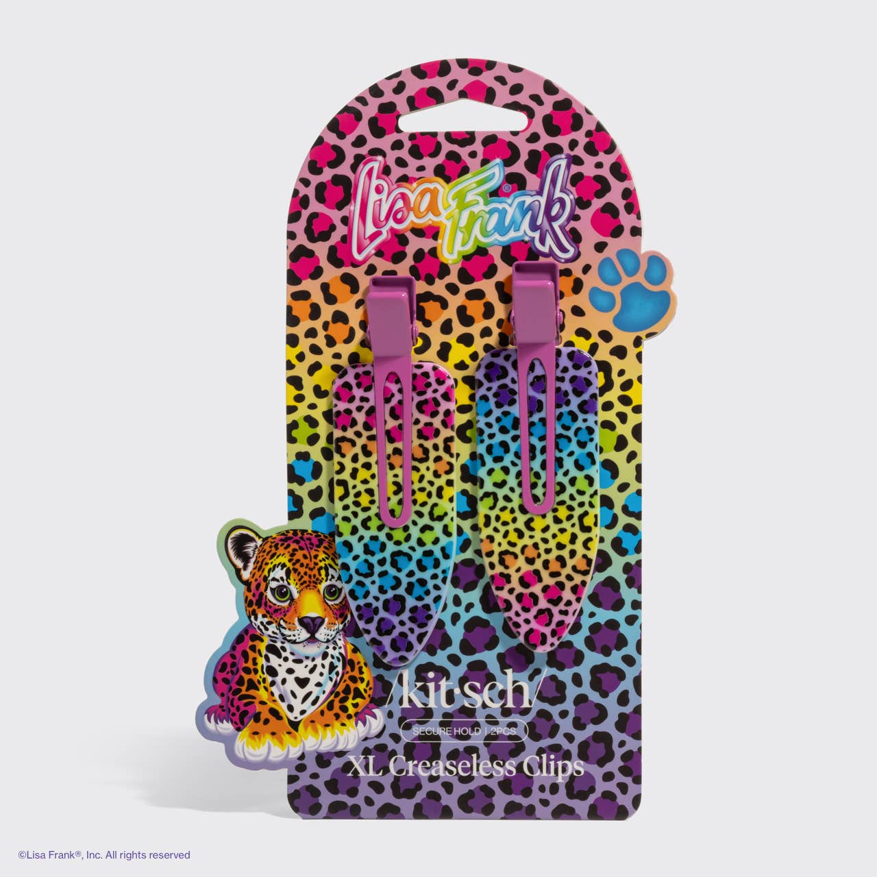 Lisa Frank x Kitsch XL Creaseless Clips in Rainbow Leopard on branded card with leopard print, ideal for secure, no-crease hair styling during makeup application.