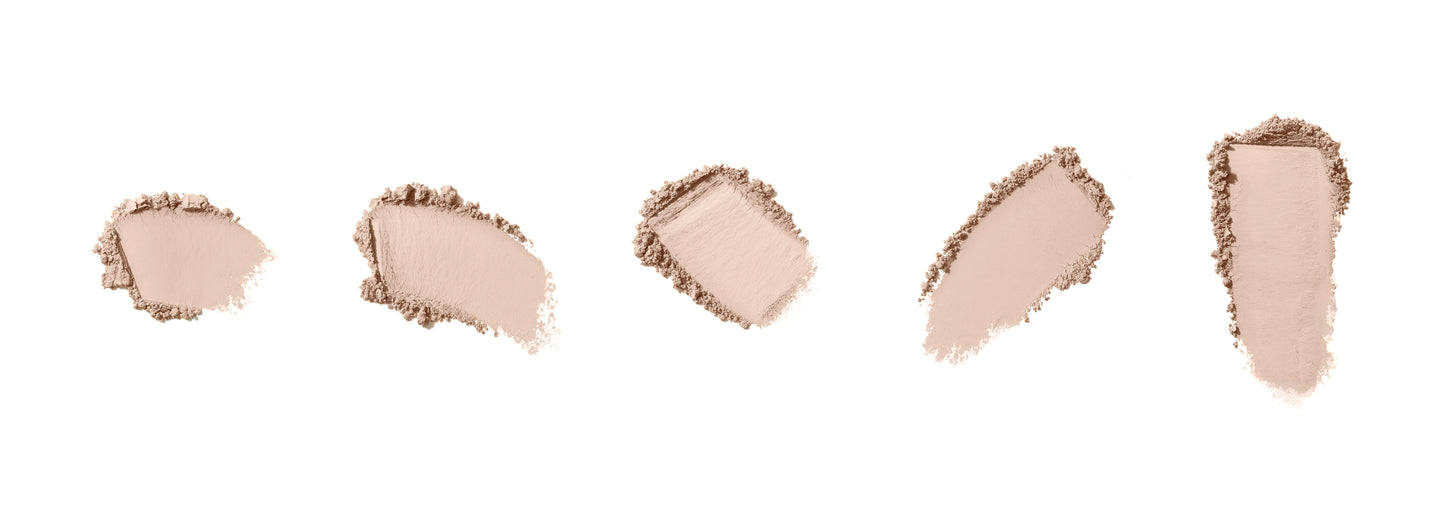 PurePressed® Base Mineral Foundation SPF 20/15 Refill: Five light beige powder swatches, showcasing texture and coverage of this multifunctional, clean beauty foundation from Beauty Shop Bellaire.