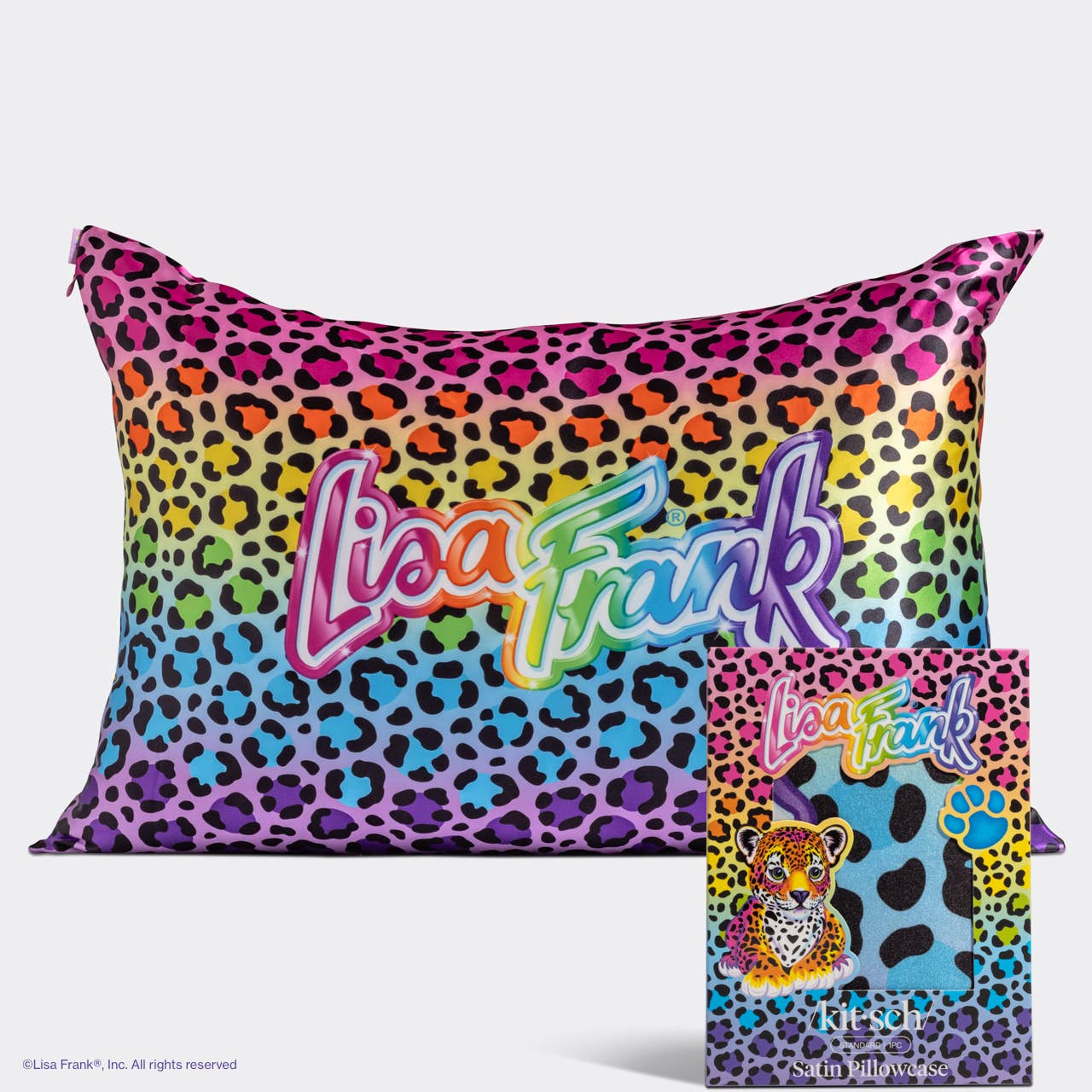 Lisa Frank x Kitsch satin pillowcase with rainbow leopard print, reduces frizz and breakouts, includes retail box with leopard cub illustration.