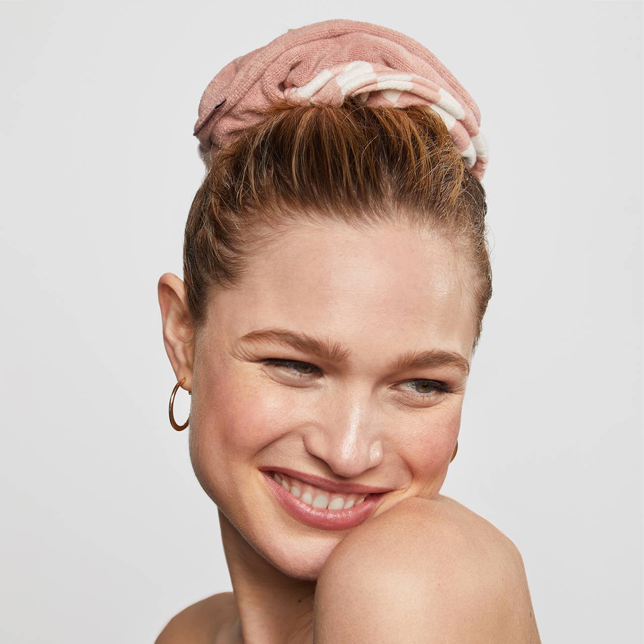 Woman wearing a Microfiber Quick-Dry Towel Scrunchie, showcasing its oversized, moisture-absorbing design, perfect for reducing frizz and breakage on wet hair.