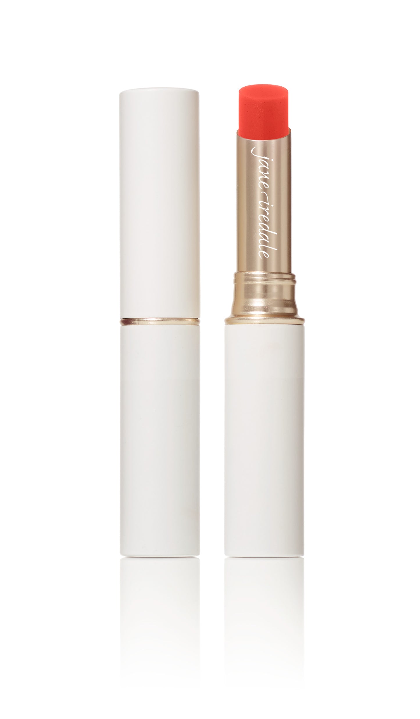 Just Kissed® Lip and Cheek Stain in coral-orange; a pH-reactive, nourishing tint for a personalized, fresh look.
