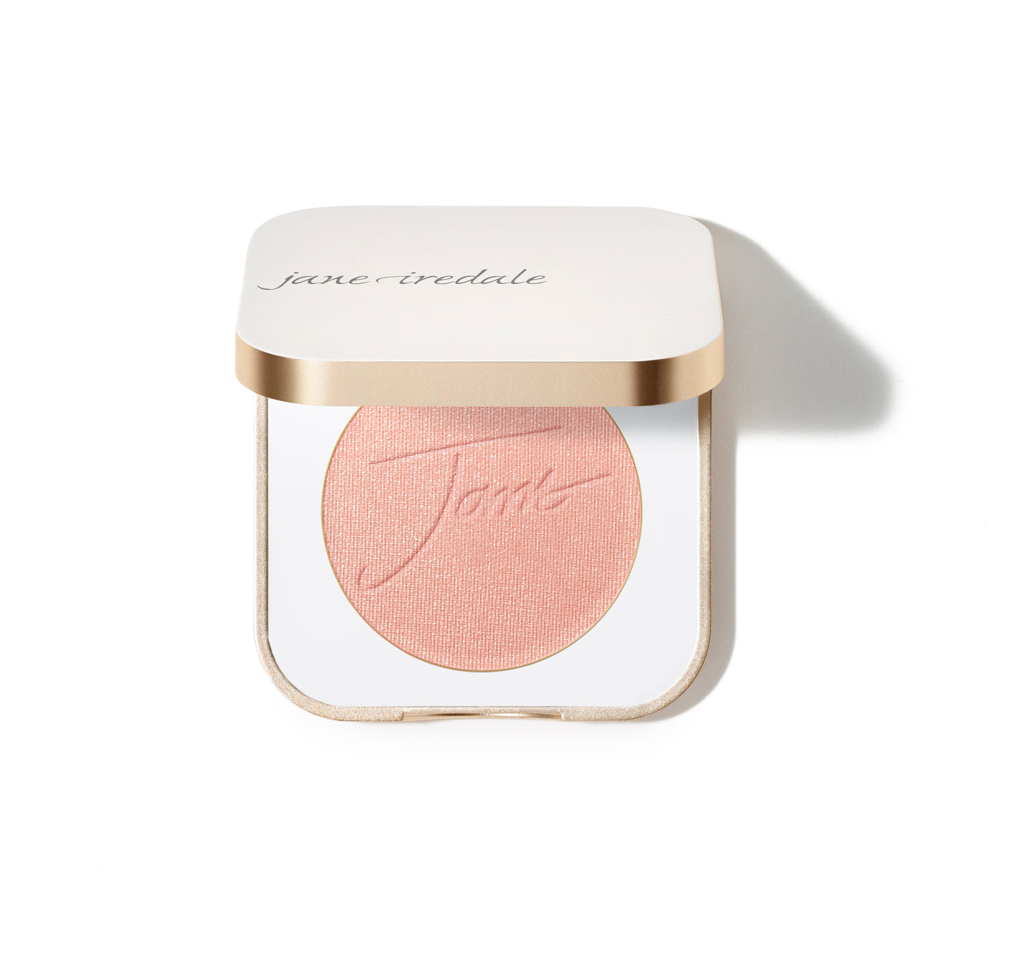 PurePressed® Blush in peach-pink; pressed powder in a square compact with jane iredale branding. Buildable, silky mineral formula for natural-looking flush.