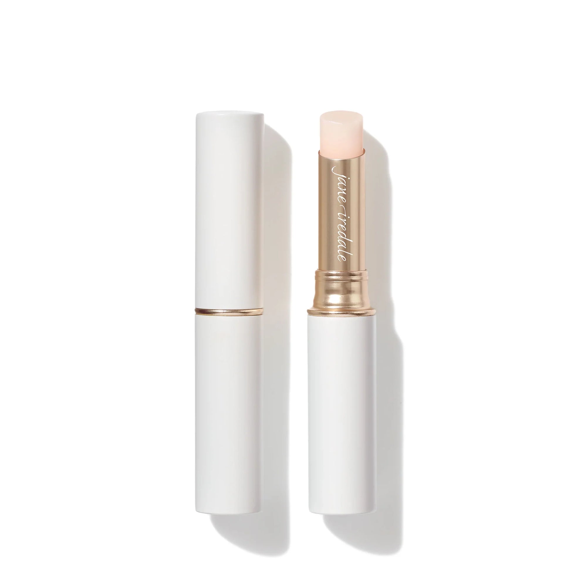 Just Kissed® Lip and Cheek Stain by Jane Iredale, shown capped and uncapped, revealing a tinted balm for personalized lip and cheek color with nourishing oils.