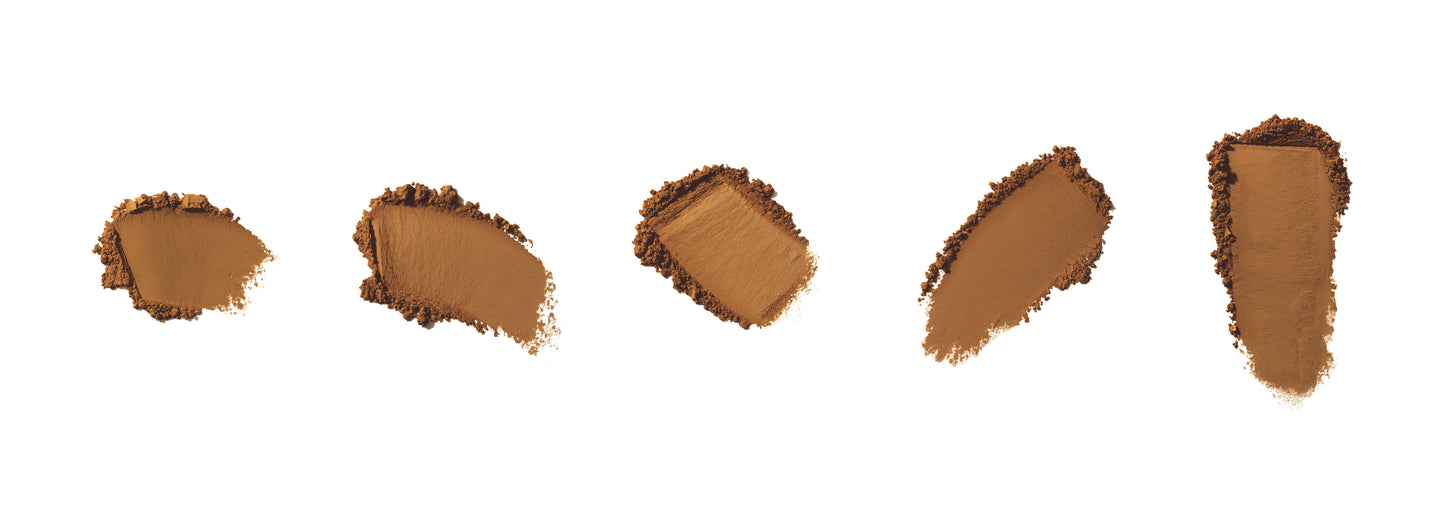 PurePressed® Base Mineral Foundation SPF 20/15 Refill swatches display five brown tones, showcasing versatile coverage and a natural finish, suitable for various skin tones.