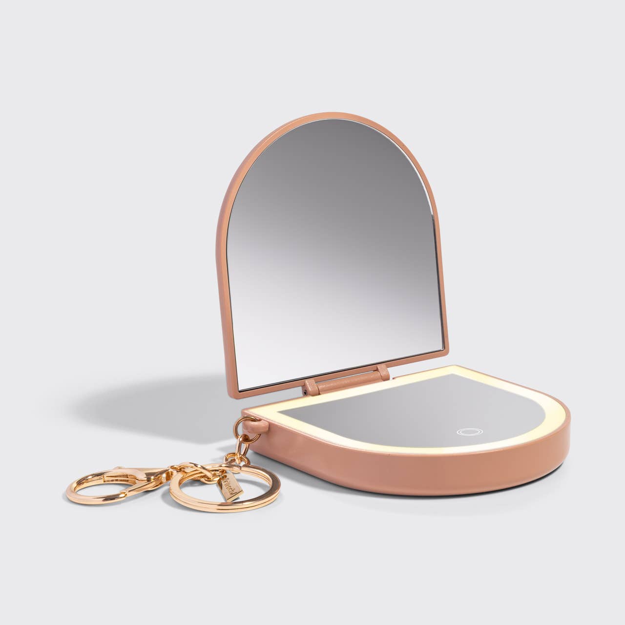 Terracotta Compact Mirror Keychain with LED lighting, dual magnification, USB-rechargeable, and gold-tone clip for easy attachment to bags or keys.