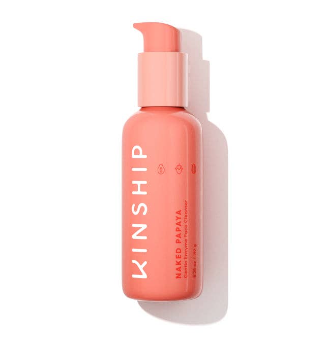 KINSHIP Naked Papaya Gentle Enzyme Milky Cleanser in a sleek pump bottle, designed to hydrate and brighten skin, dermatologist recommended and award-winning.