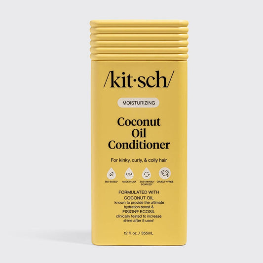 Yellow rectangular bottle of Kitsch Moisturizing Coconut Oil Conditioner, 12 fl. oz, bio-based, cruelty-free, formulated for kinky, curly, coily hair with coconut oil and FISION® Ecosil.