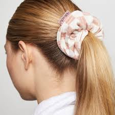 Back view showing long hair in a ponytail secured by a Kitsch Towel Scrunchie - Terracotta Checker, made from moisture-absorbing microfiber, ideal for reducing frizz.