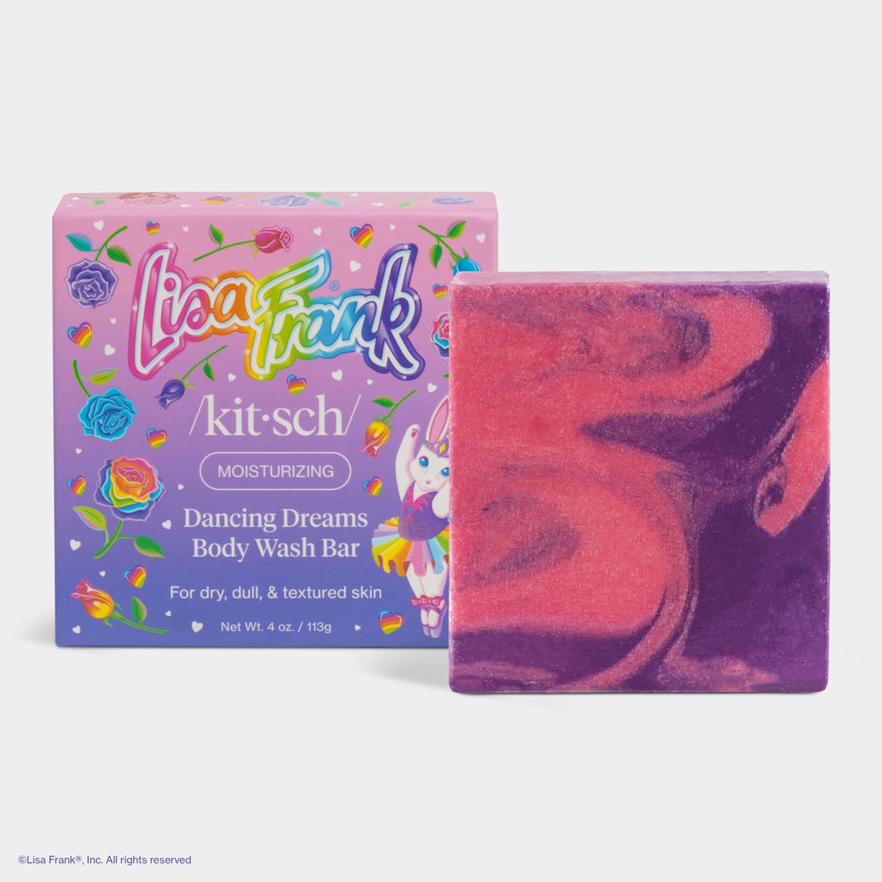 Lisa Frank x Kitsch Dancing Dreams Body Wash Bar with pink-purple swirls, in a colorful box featuring a unicorn-cat, ideal for dry skin.