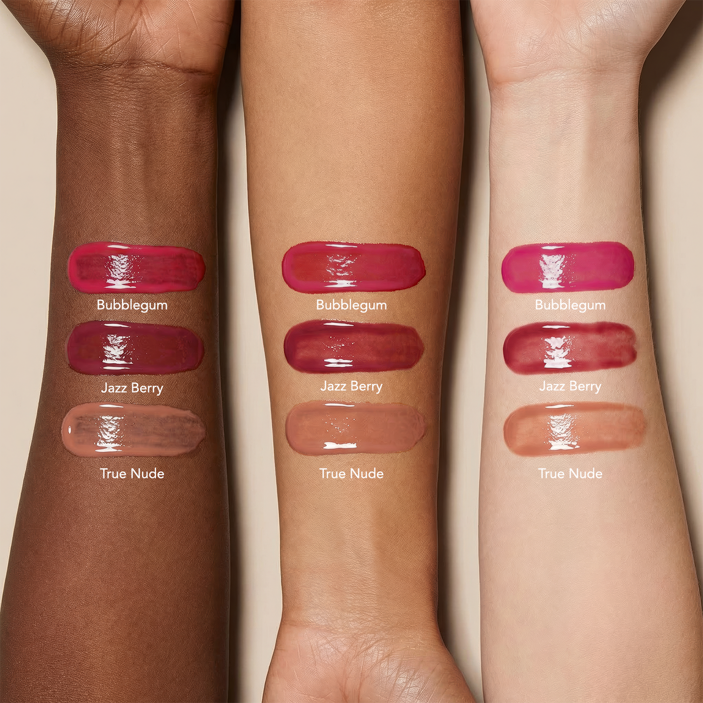 Three forearms with varying skin tones display swatches of SPF 40 Nourishing Lip Serum in Bubblegum, Jazz Berry, and True Nude shades.