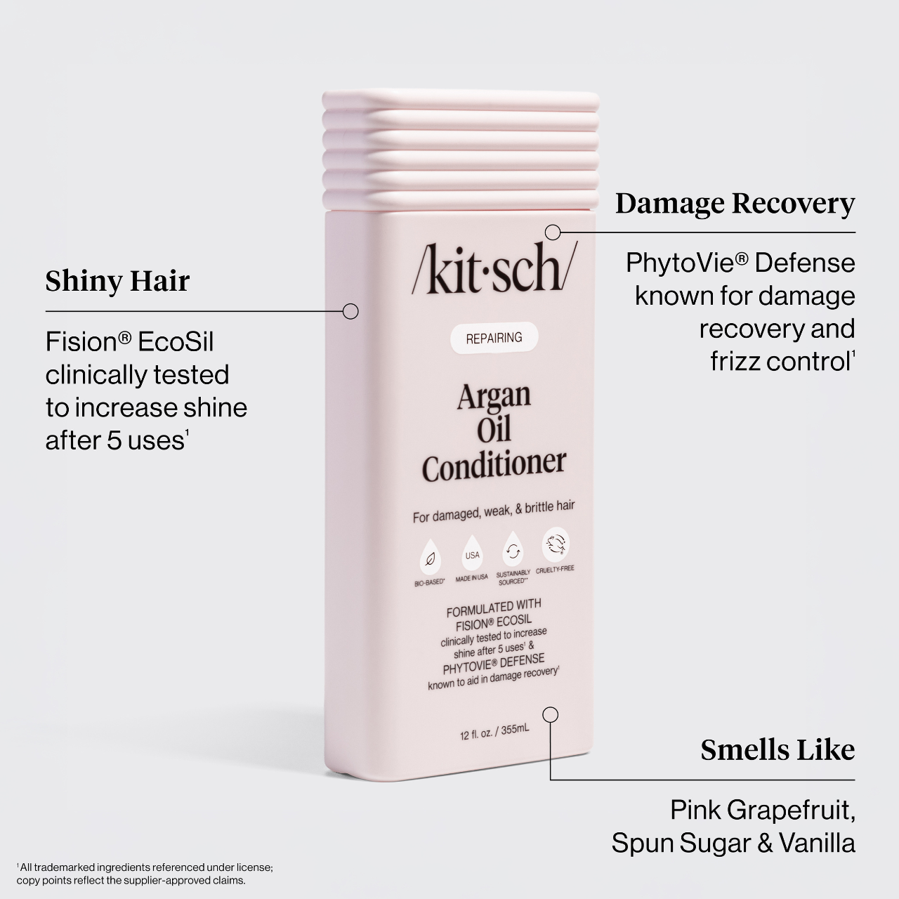 Tall pale-pink bottle of /kitsch/ Repairing Argan Oil Conditioner for damaged hair, featuring argan oil, Fision® EcoSil, and PhytoVie® Defense, in a bio-based, cruelty-free formula.