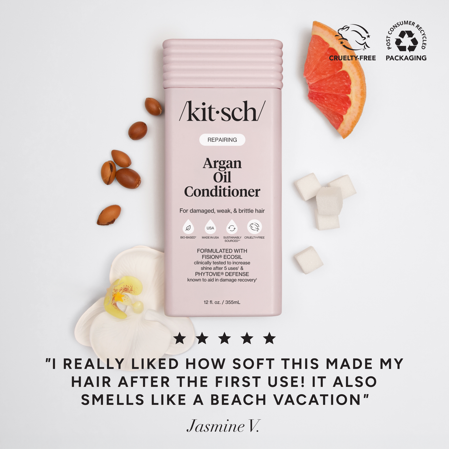 Repairing Argan Oil Conditioner bottle with argan nuts, grapefruit, sugar cubes, orchid, and icons for cruelty-free and recycled packaging, highlighting softness and beach-like fragrance.