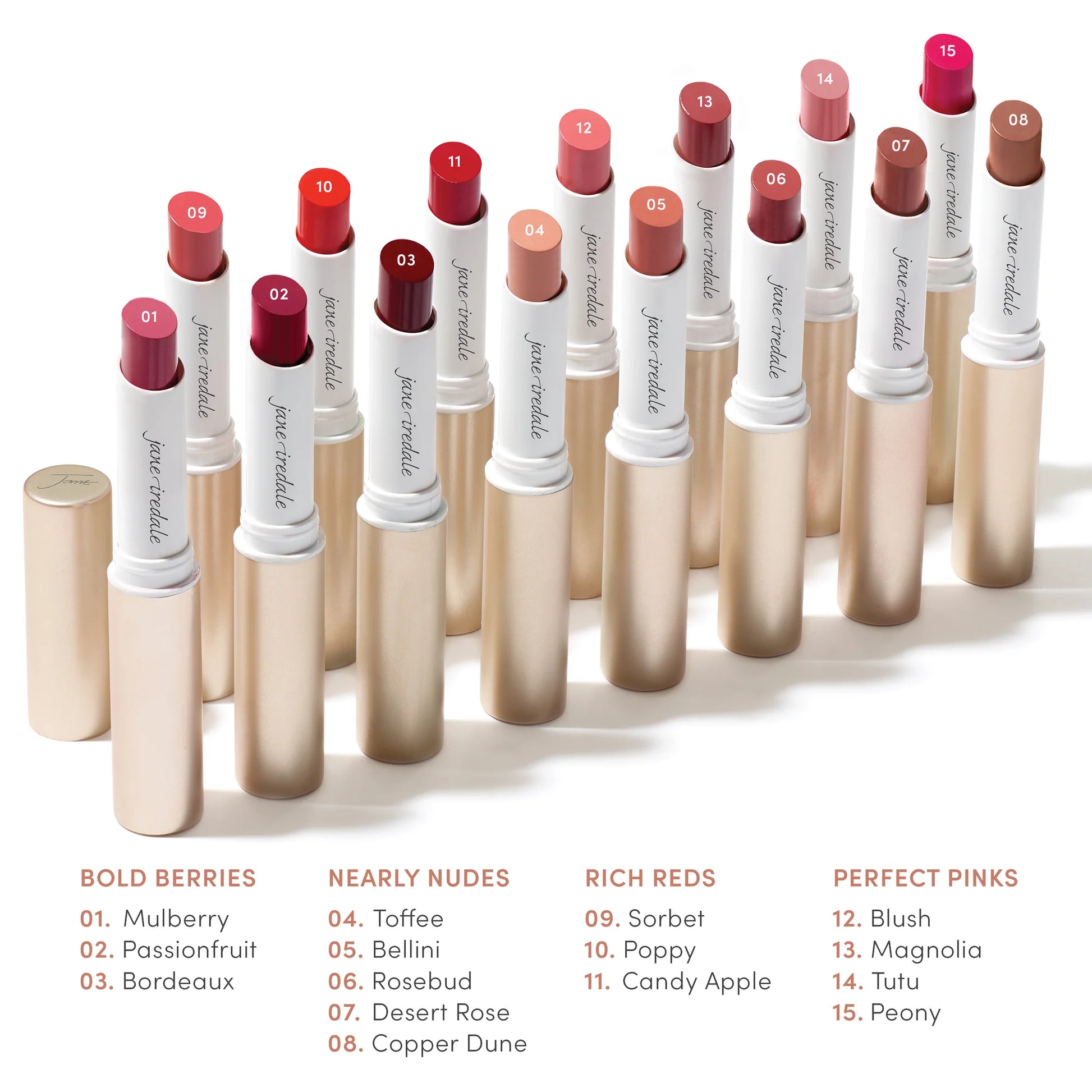ColorLuxe Hydrating Cream Lipstick lineup in gold-and-white tubes, showcasing 15 shades from berries, nudes, reds, to pinks, numbered and named for easy selection.