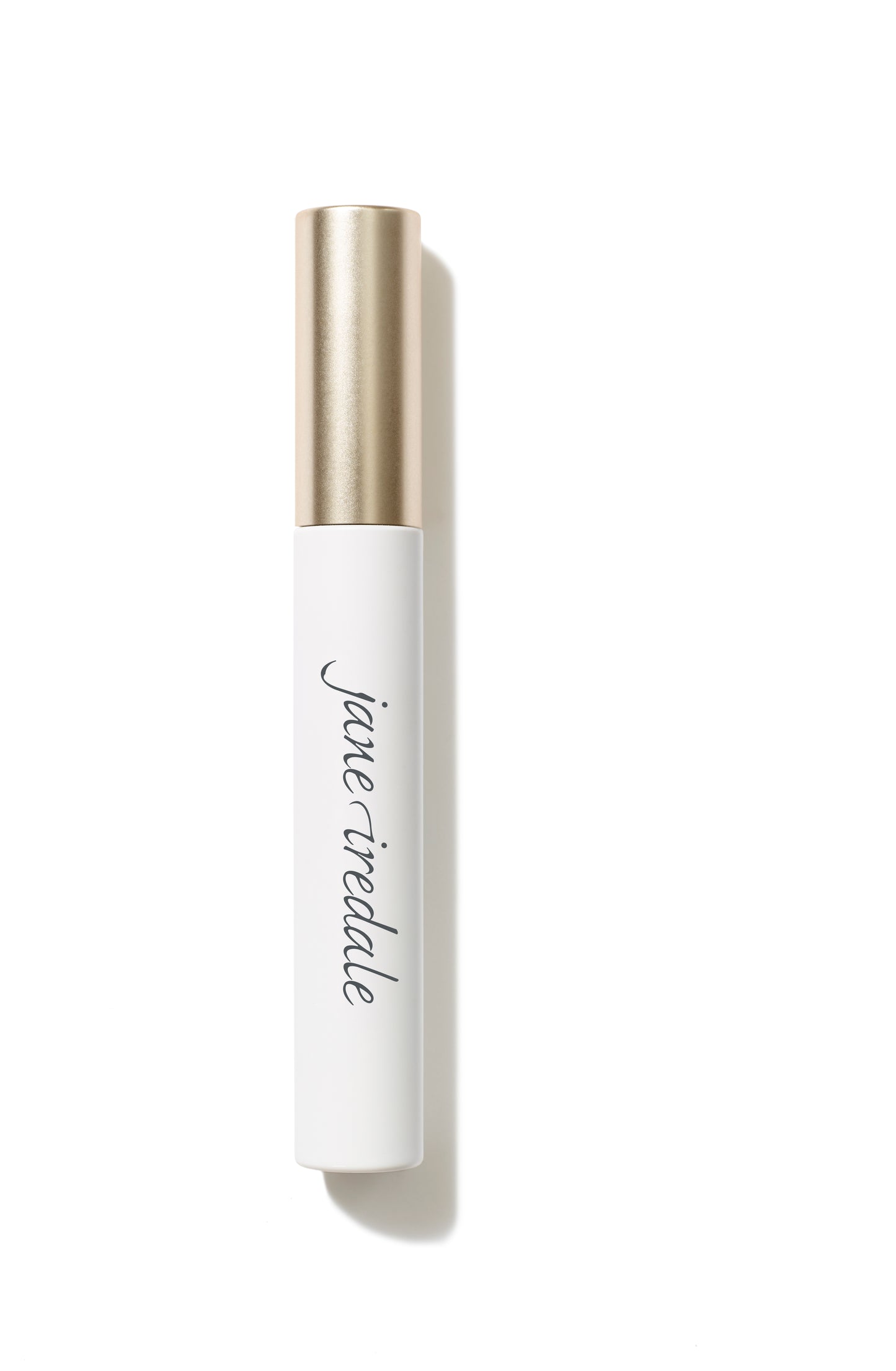 Jane Iredale's Beyond Lash™ Volumizing Mascara in a sleek white tube with a gold cap, offering clean, buildable volume and natural lash nourishment.