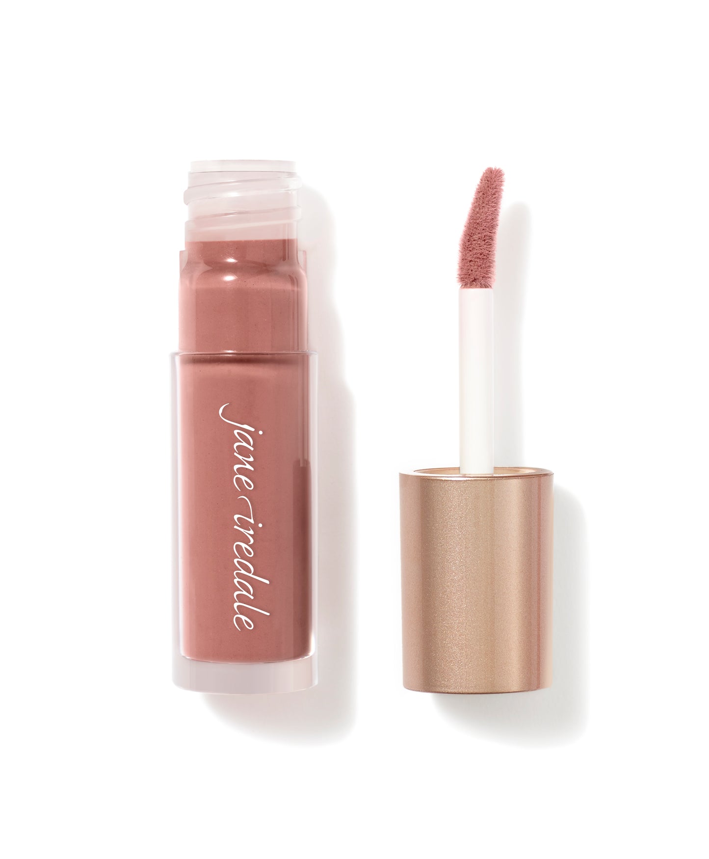 Beyond Matte® Lip Stain by jane iredale, a muted rose shade with a doe-foot applicator, offers long-wearing, buildable matte color without feathering or fading.