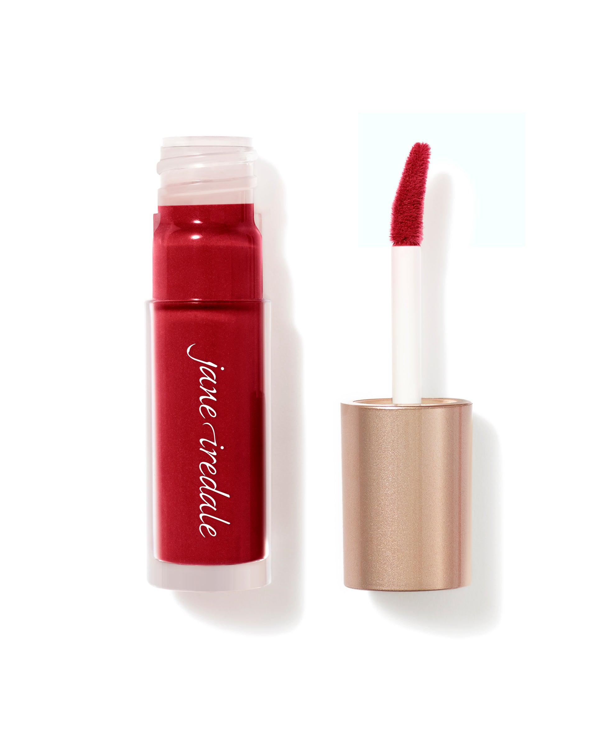 Beyond Matte® Lip Stain in a clear-and-rose-gold tube with doe-foot applicator, offers long-lasting, buildable matte color for comfortable, everyday wear.
