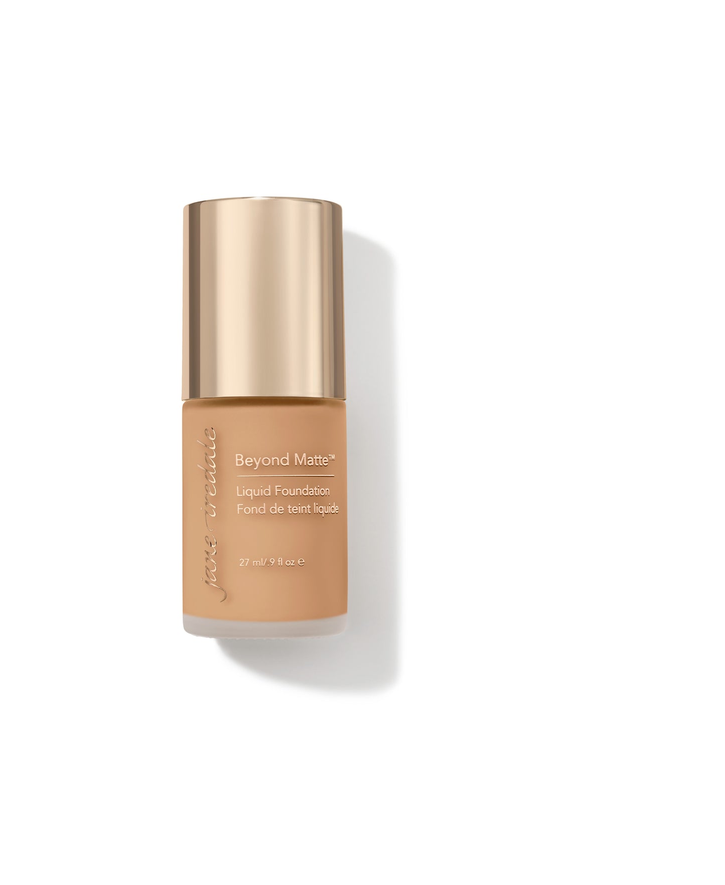 Beyond Matte™ Liquid Foundation in frosted glass with gold cap, offering buildable, semi-matte coverage with plant-based ingredients for pore-minimizing, weightless wear.