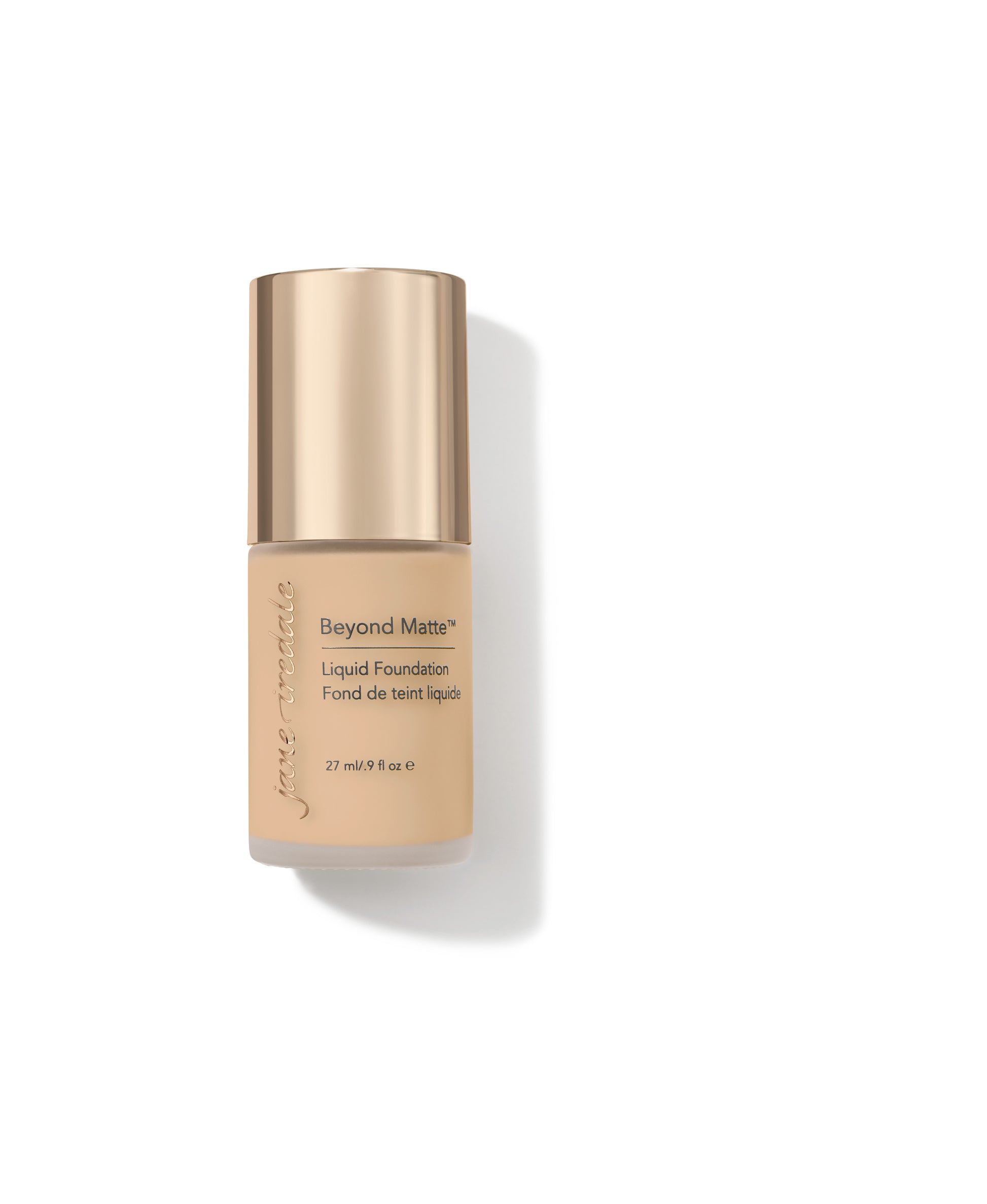 Beyond Matte™ Liquid Foundation in a frosted-glass bottle with gold cap; offers buildable, semi-matte coverage with plant-based ingredients for pore-minimizing, natural finish.