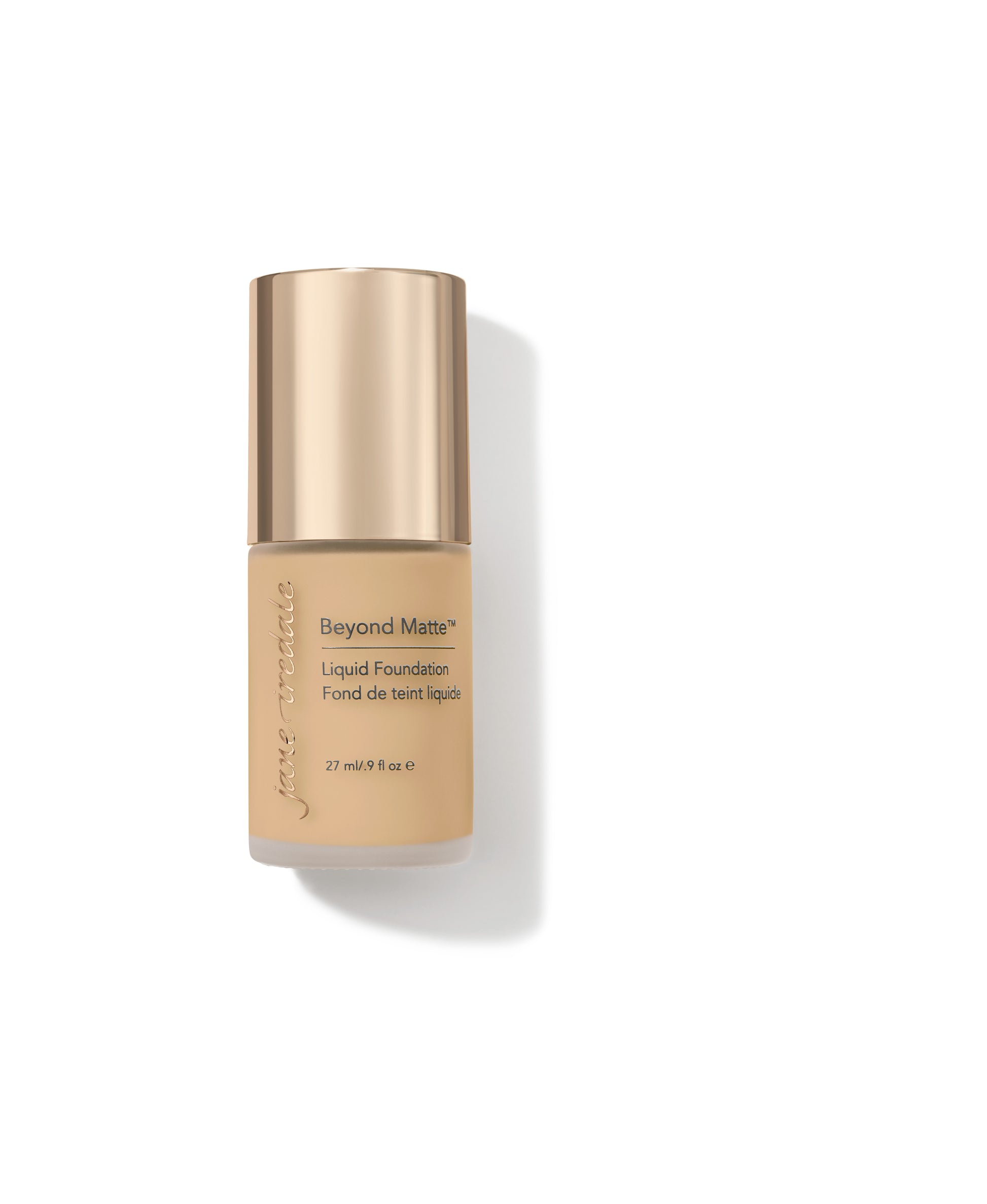 Beyond Matte™ Liquid Foundation in a glass bottle with rose-gold cap, offering buildable, semi-matte finish with skin-nourishing, plant-based ingredients.