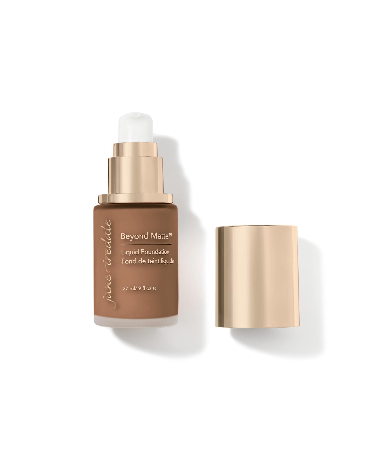 Beyond Matte™ Liquid Foundation in a brown pump bottle with gold-tone cap, offering buildable semi-matte finish with plant-based, pore-minimizing ingredients.