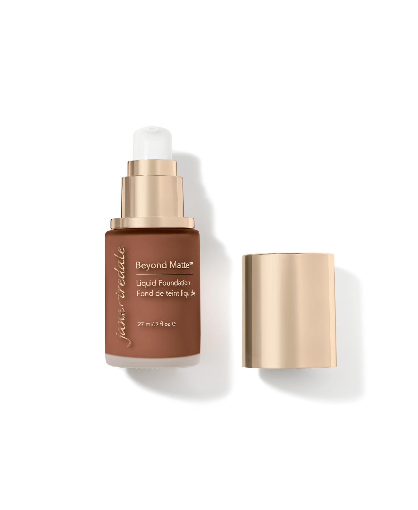 Jane Iredale's Beyond Matte™ Liquid Foundation in a matte brown bottle with gold pump, offering buildable, semi-matte coverage with plant-based, pore-minimizing ingredients.