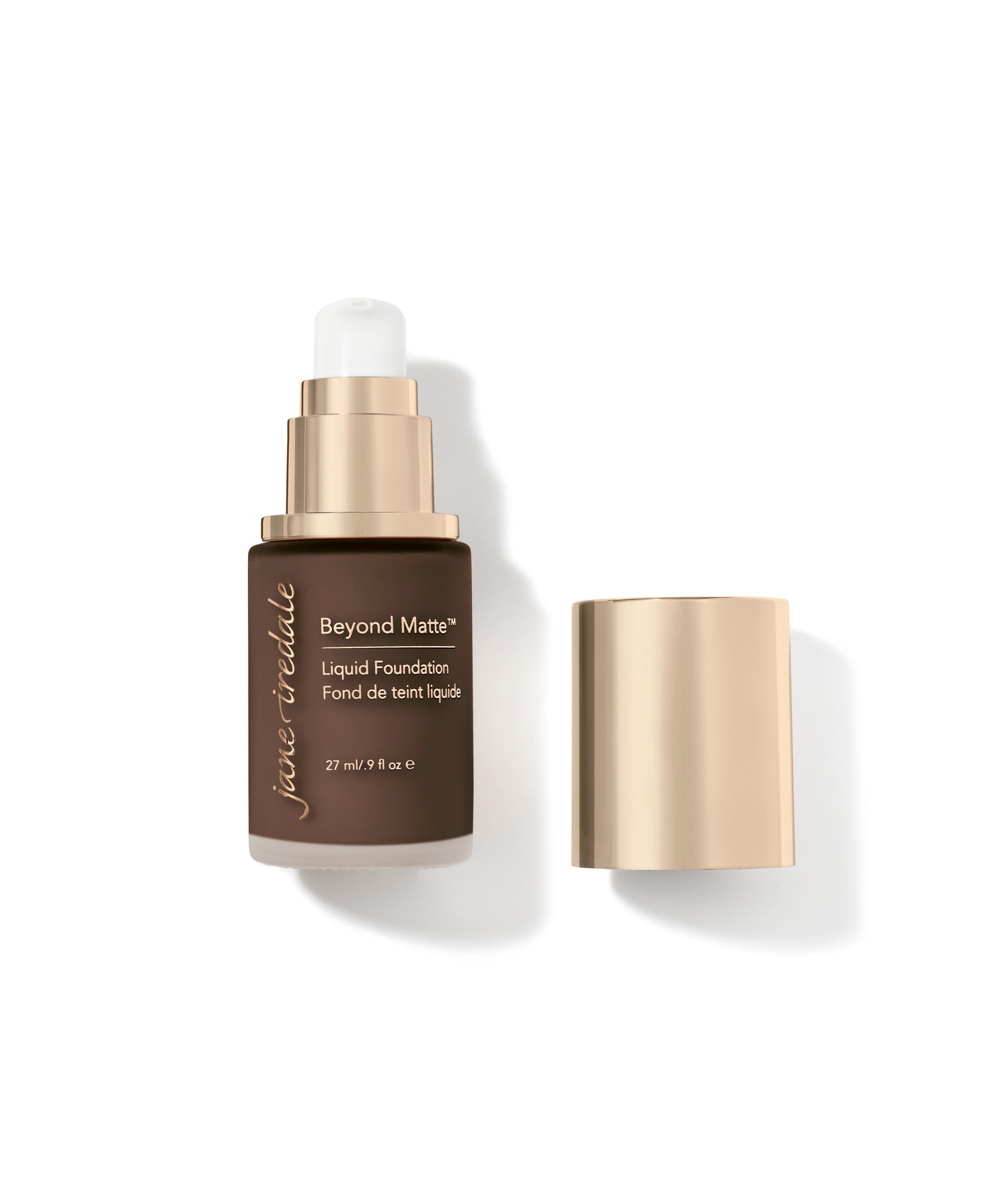 Beyond Matte™ Liquid Foundation in a dark brown glass bottle with a gold cap, offering buildable, semi-matte coverage with plant-based, pore-minimizing ingredients.