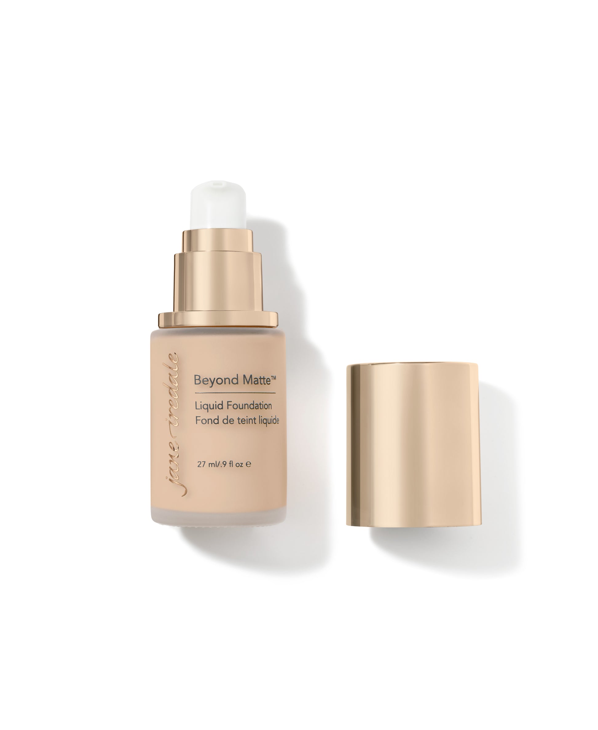 Beyond Matte™ Liquid Foundation in a pump bottle with gold-tone cap alongside, offering buildable, semi-matte coverage with skin-nourishing, plant-based ingredients.