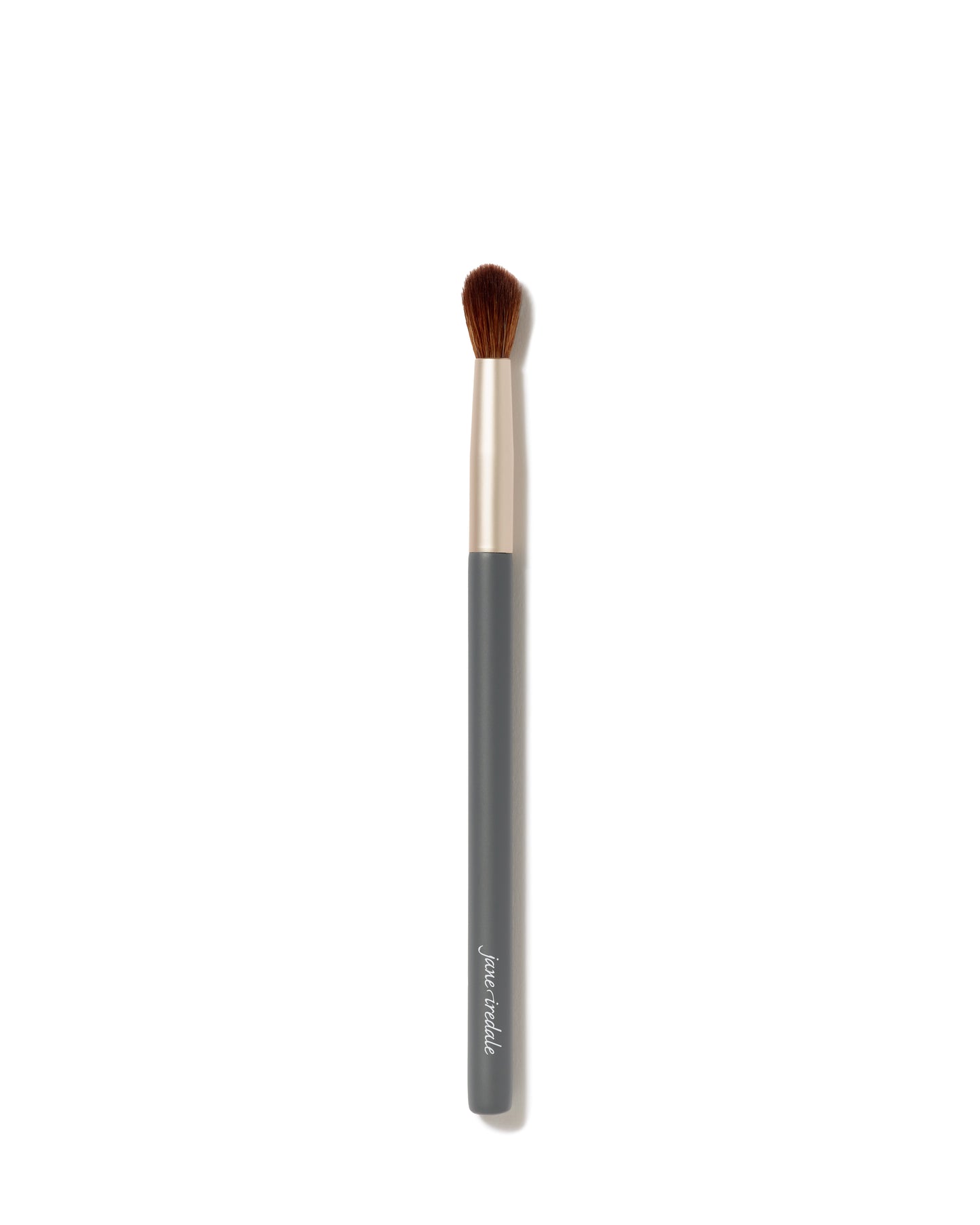 Crease Brush with soft, rounded bristles and a matte gray handle, designed for effortless eyeshadow blending and professional results.