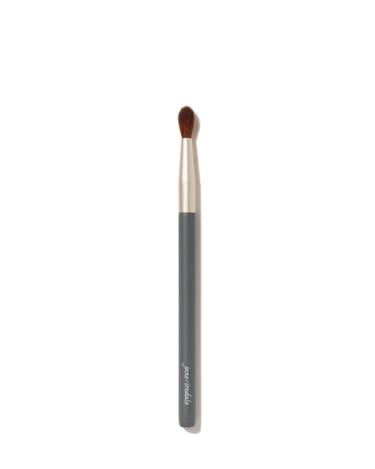 Detail Brush with gray handle and gold ferrule, featuring soft brown bristles for precise eye and lip application, crafted for even product distribution.