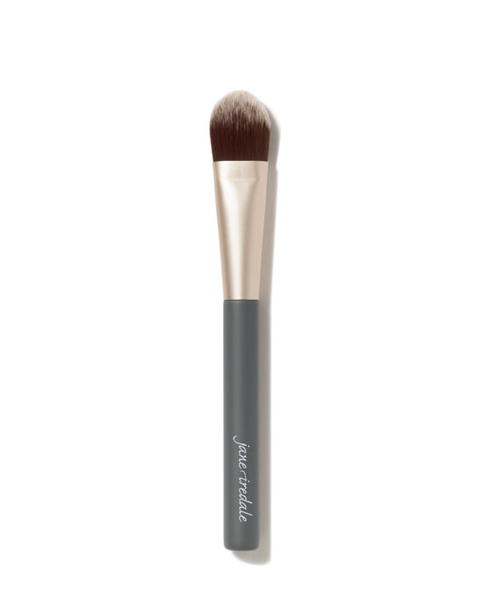 Liquid Complexion Brush: An angled, flat-top foundation brush with soft, dual-toned bristles and a dark gray handle, ideal for streak-free application of liquid and cream foundations.