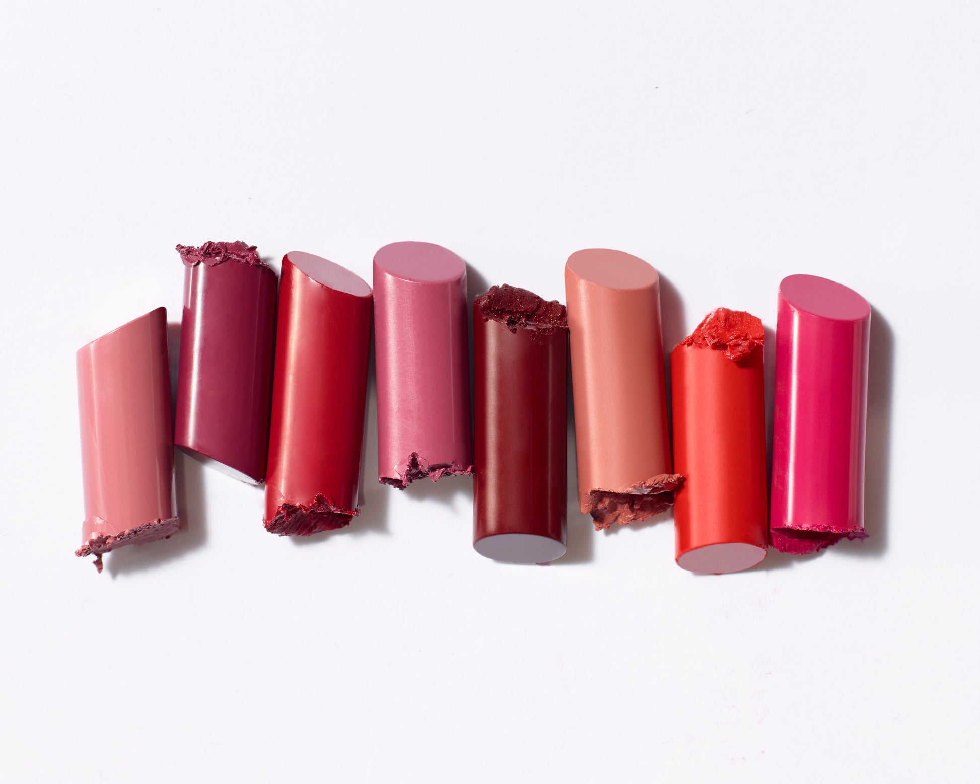 ColorLuxe Hydrating Cream Lipstick segments in varied shades, showcasing a creamy, nourishing formula with a satin finish, ideal for vibrant, all-day wear.