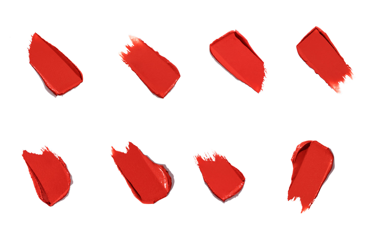 ColorLuxe Hydrating Cream Lipstick swatches showcase vibrant, creamy red shades with varied textures, highlighting the rich, hydrating formula's satin finish and comfortable wear.