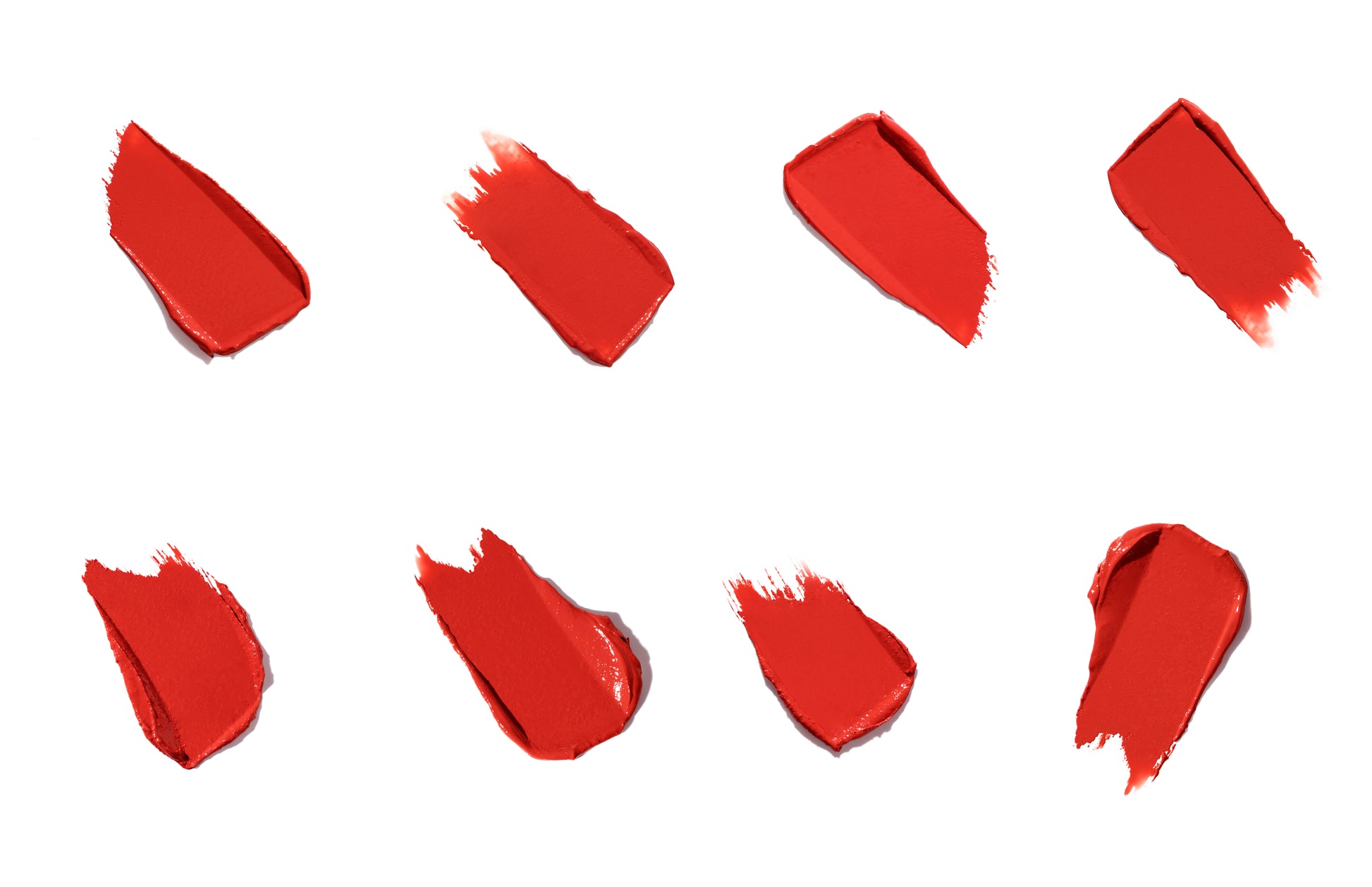 ColorLuxe Hydrating Cream Lipstick swatches showcase vibrant, creamy red shades with varied textures, highlighting the rich, hydrating formula's satin finish and comfortable wear.