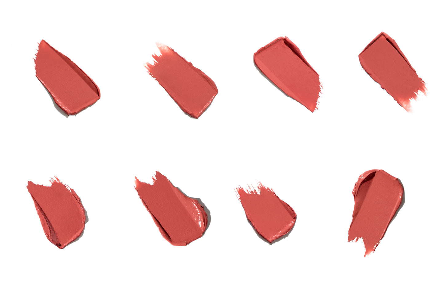 ColorLuxe Hydrating Cream Lipstick swatches in coral-rosy shades, showcasing its creamy texture and satin finish, highlighting its hydrating, comfortable wear from Beauty Shop Bellaire.