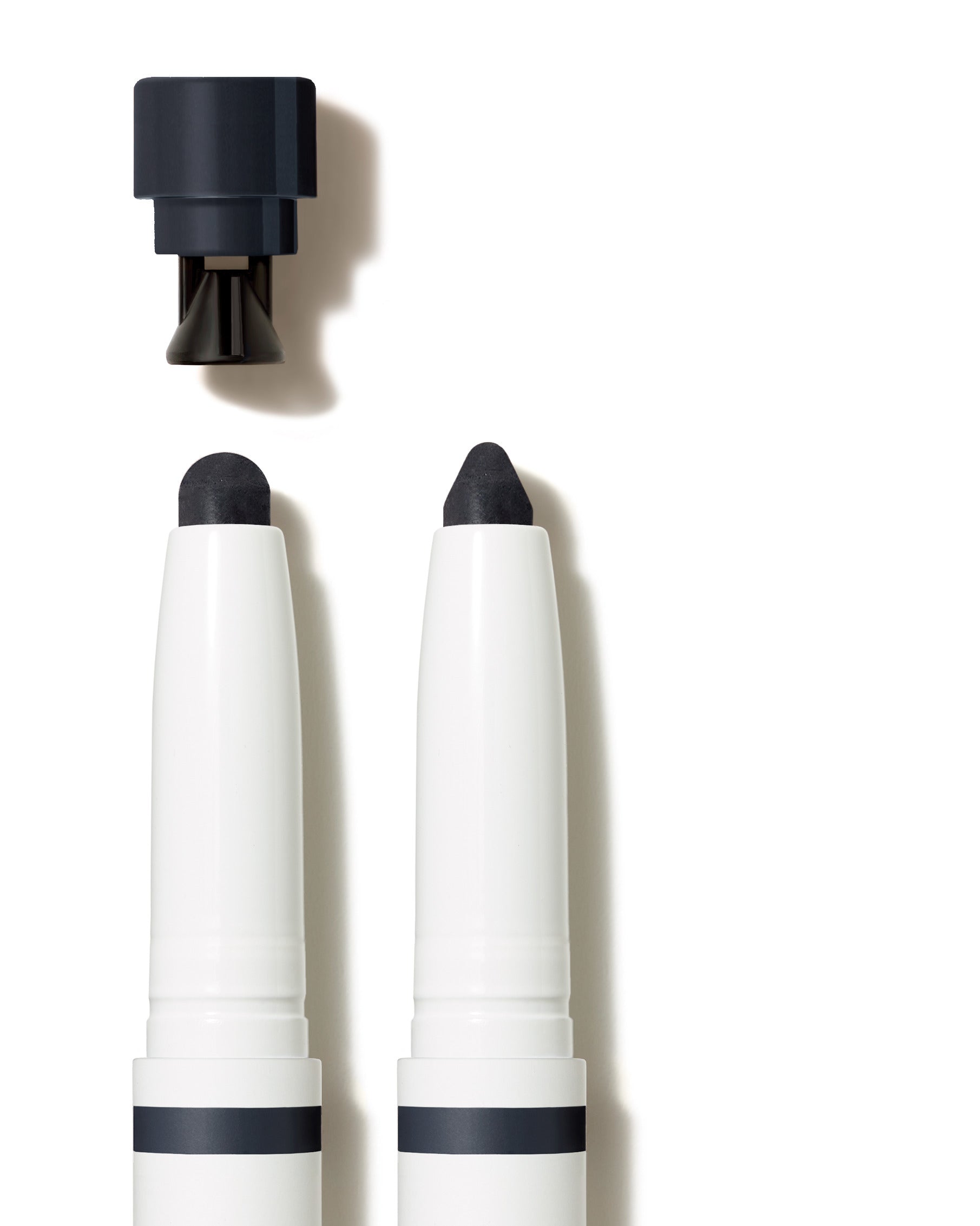 ColorLuxe Eye Shadow Stick duo with black sponge tips and caps, showcasing easy, blendable application and long-wear formula, ideal for seamless eye looks.