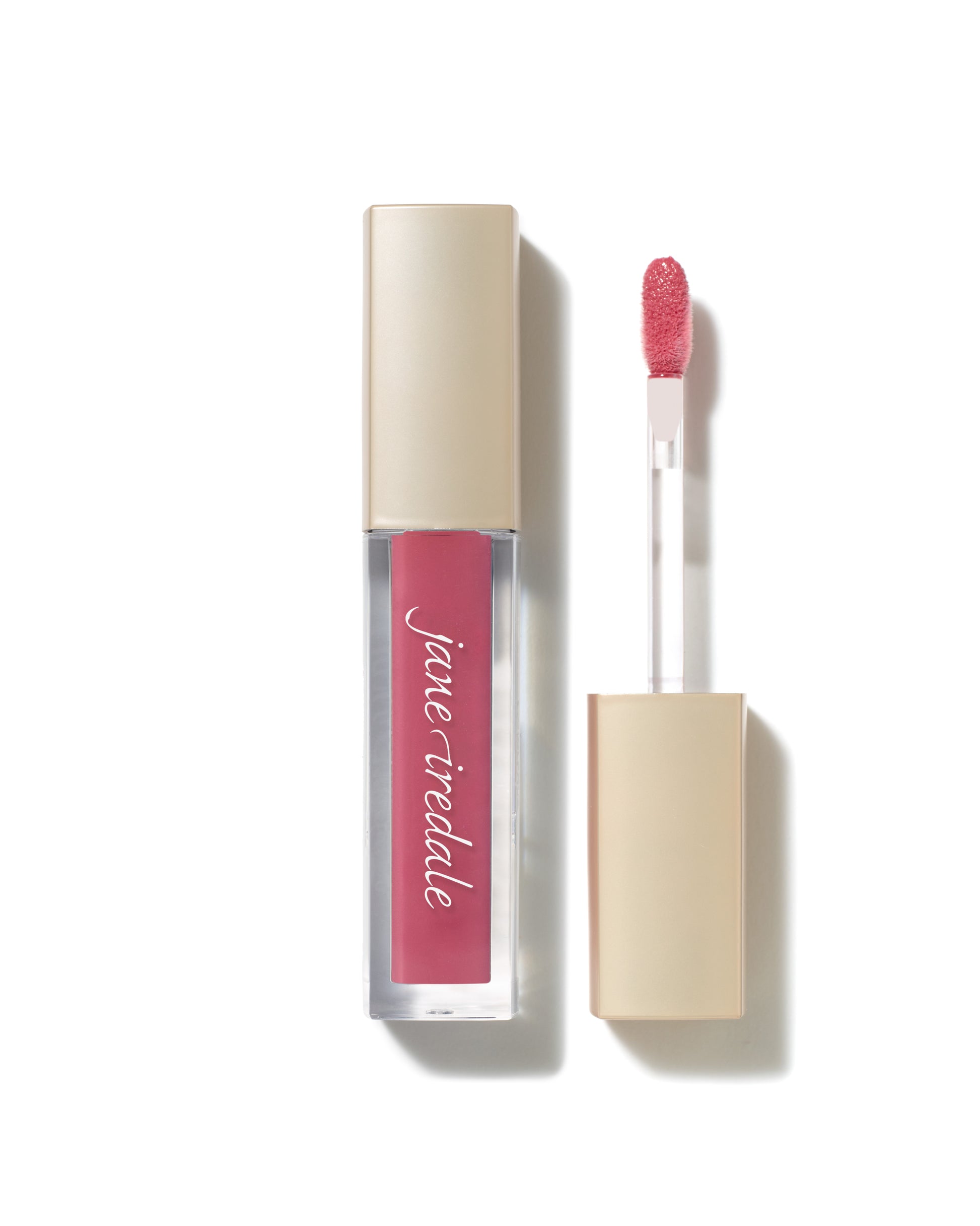 ColorLuxe High Impact Lip Glaze in muted rose-pink with champagne-gold accents, featuring a nourishing, high-pigmentation formula for a glossy, comfortable wear.