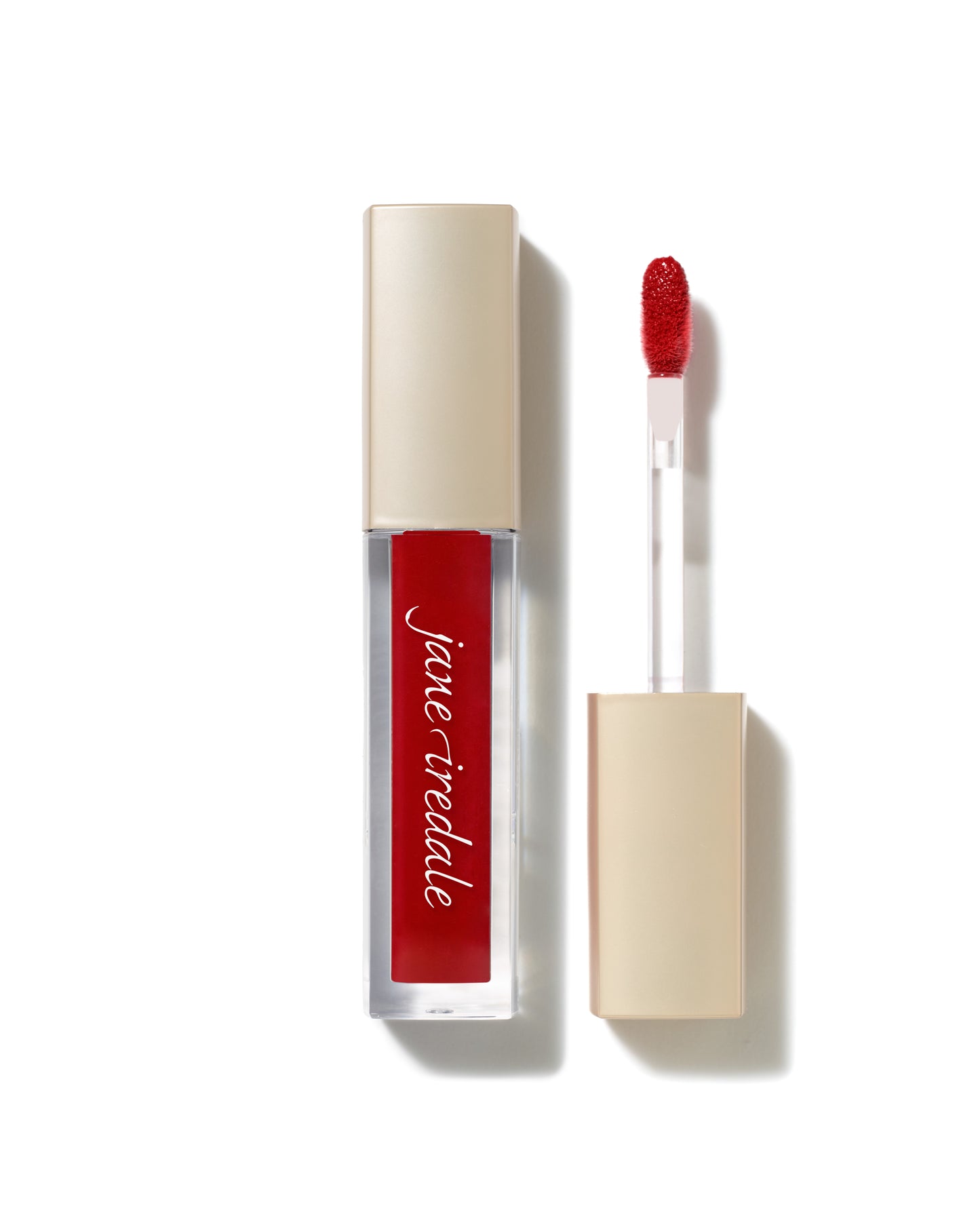 ColorLuxe High Impact Lip Glaze in red, featuring a doe-foot applicator, glossy finish, and high pigmentation, by jane iredale, showcased on a white background.