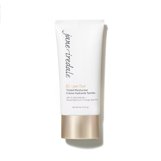 Dream Tint® Tinted Moisturizer SPF 15 in a white tube with gold cap, offering lightweight coverage, hydration, and broad-spectrum protection for a natural look.