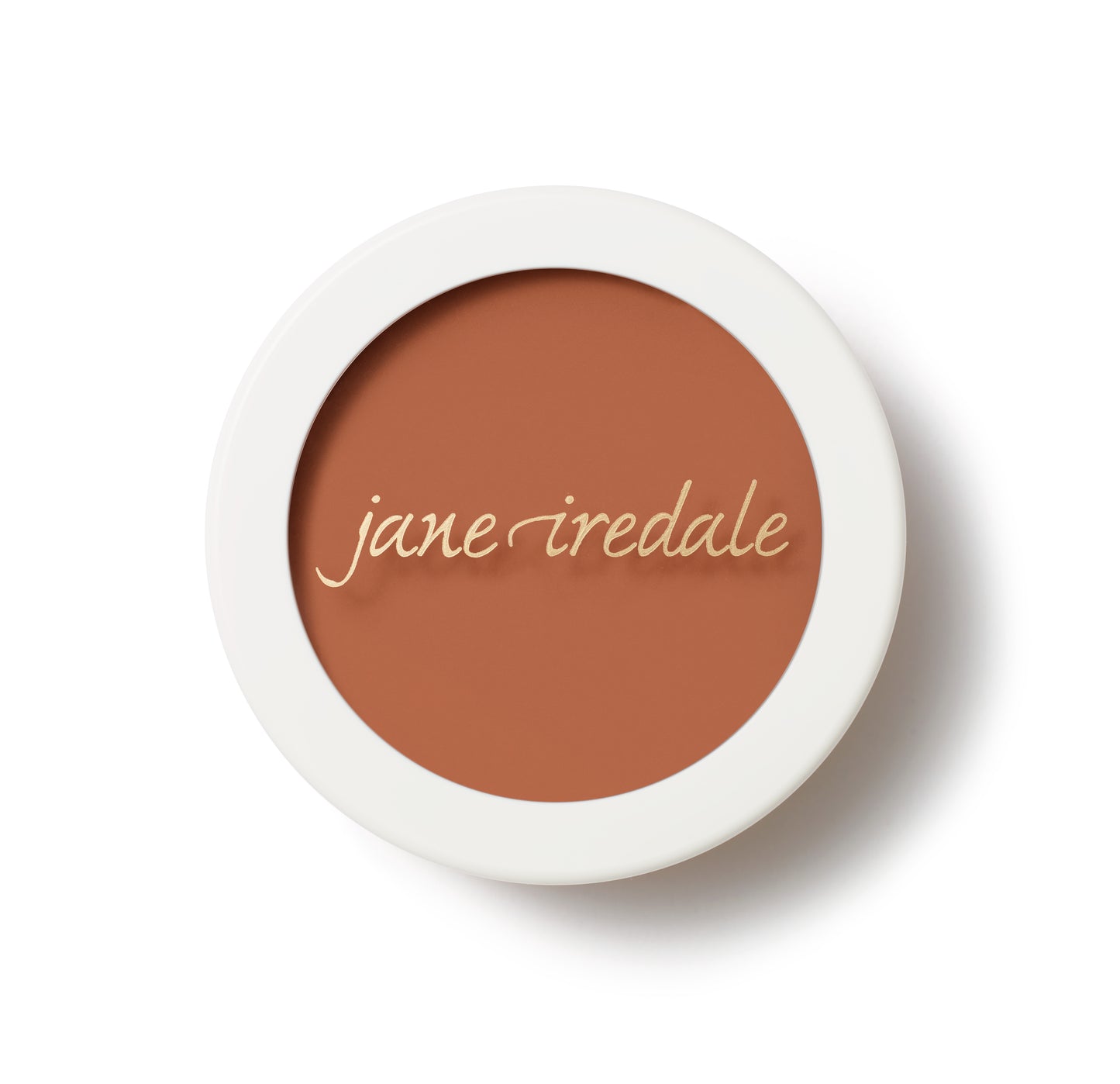 Enlighten Concealer™ by Jane Iredale, a compact featuring a warm terra-cotta cream for brightening and even skin tone, embossed with gold script.