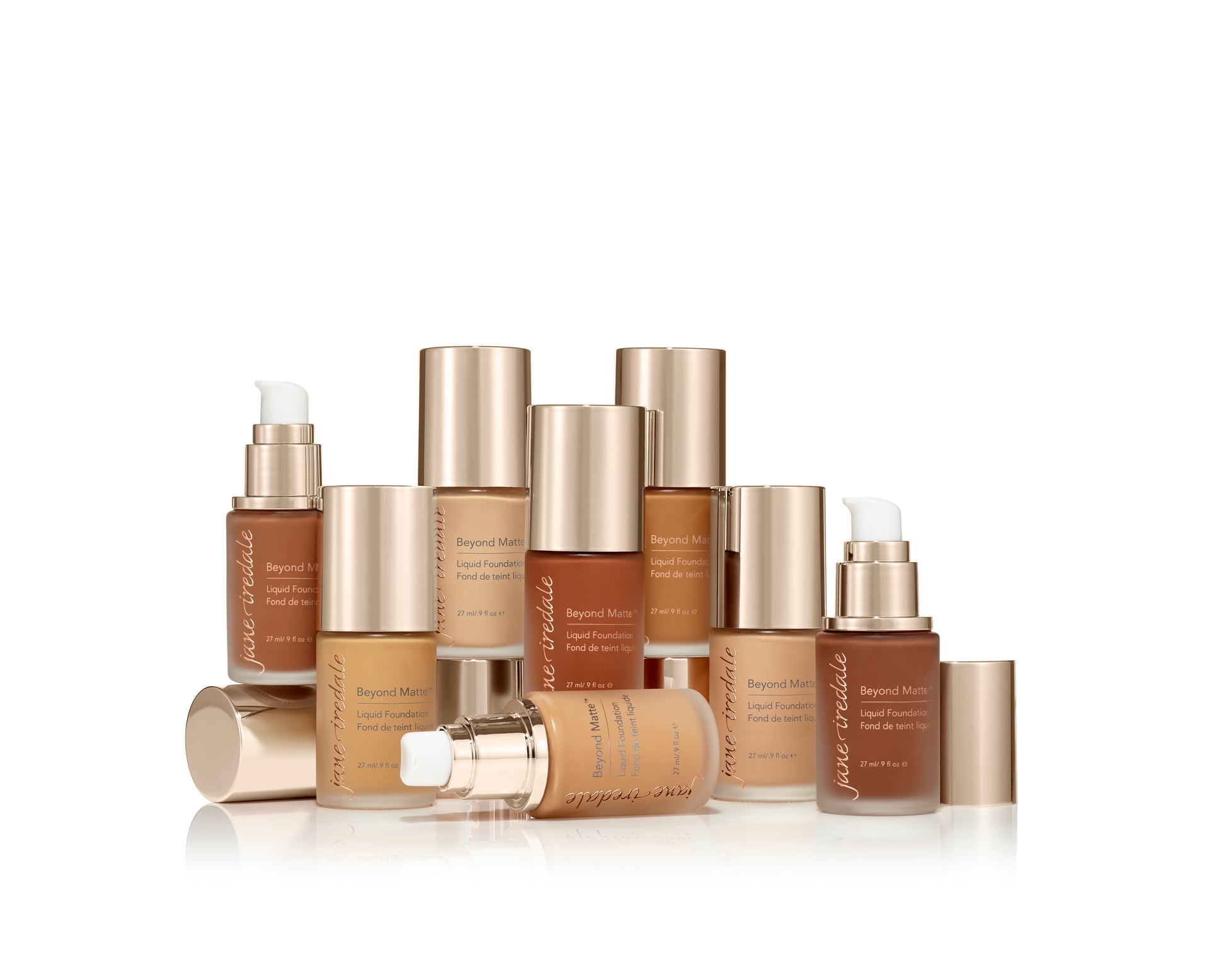 Jane Iredale Beyond Matte Liquid Foundation bottles in matte-golden packaging showcasing diverse skin-tone shades with buildable, semi-matte finish and skin-nourishing plant-based ingredients.