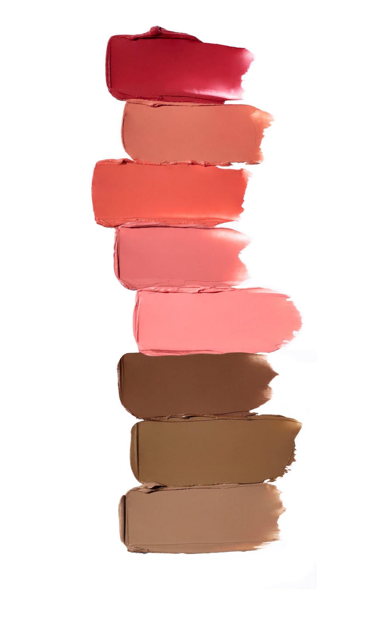 Glow Time® Blush Stick swatches showing creamy, buildable shades from berry-red to tan, highlighting a natural, skin-like finish with skin-loving botanicals.