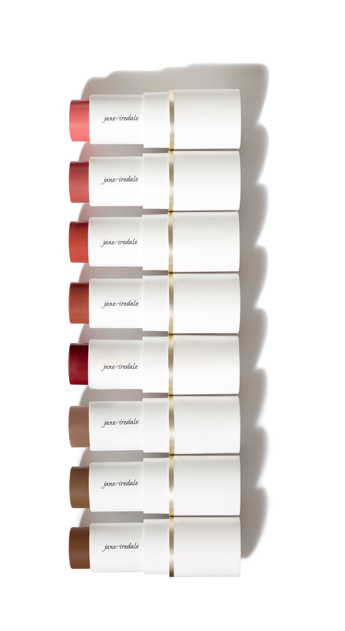 Glow Time® Blush Stick: Seven sleek cylinders with colored tips, offering versatile, creamy application for cheeks, enhanced with skin-loving botanicals and a natural finish.