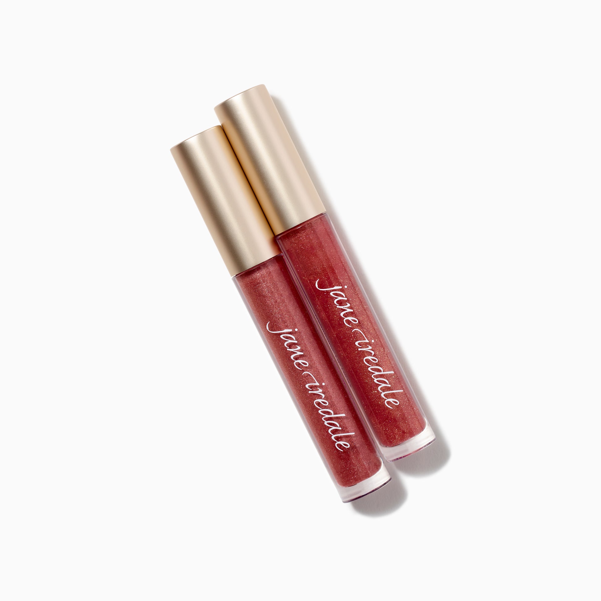 HydroPure™ Hyaluronic Acid Lip Gloss by jane iredale, showcasing two tubes with a clear base and gold cap, highlighting its hydrating, plumping benefits and high-shine finish.