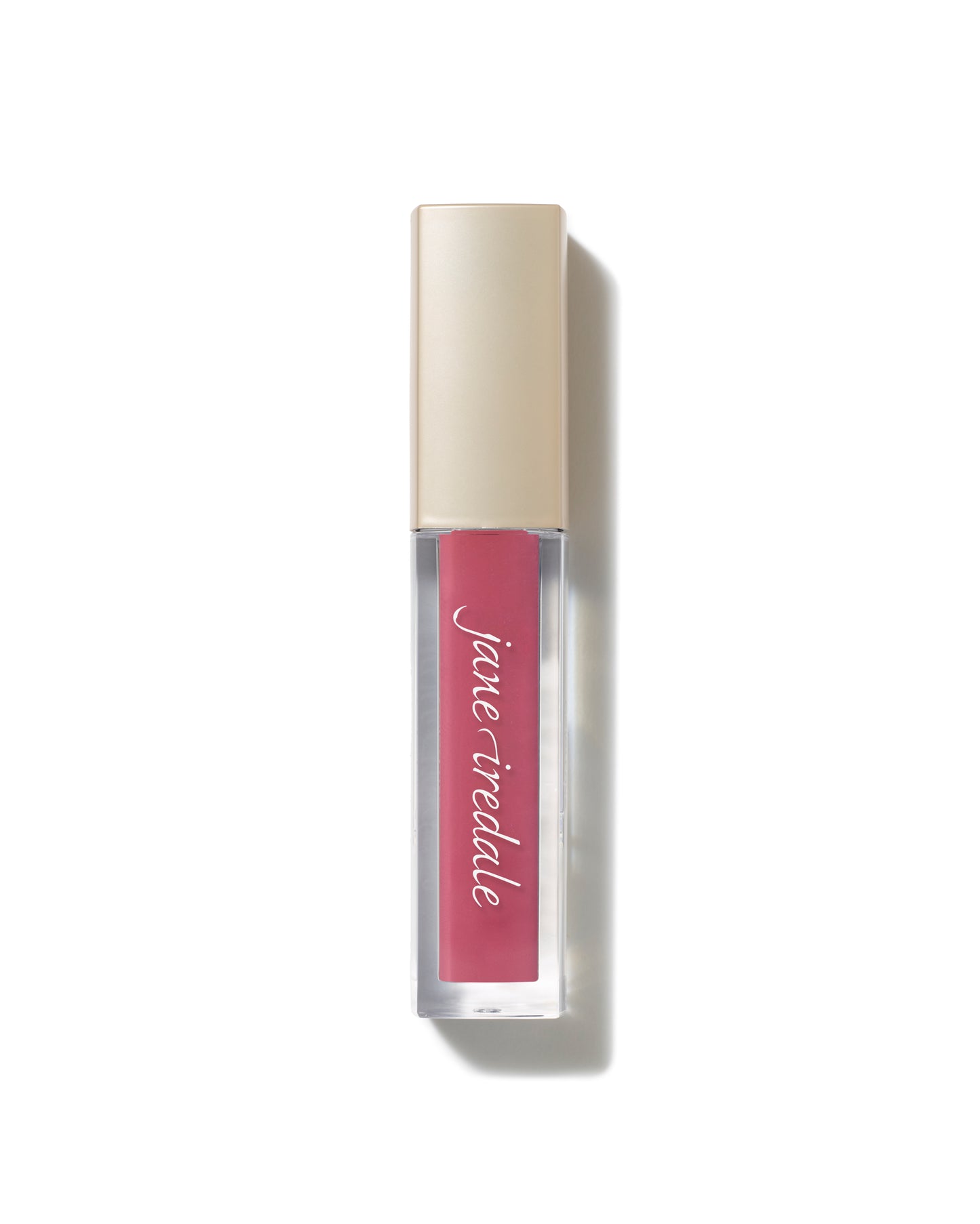 Jane Iredale's ColorLuxe High Impact Lip Glaze in a clear tube shows pink-rose color with gold-beige cap, offering bold color and glossy finish.