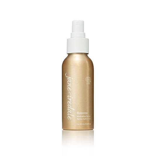 Gold spray bottle labeled Balance Hydration Spray, 90 mL, ECOCERT certified. Preps, sets, refreshes skin with botanical extracts. Ideal for combination or oily skin.