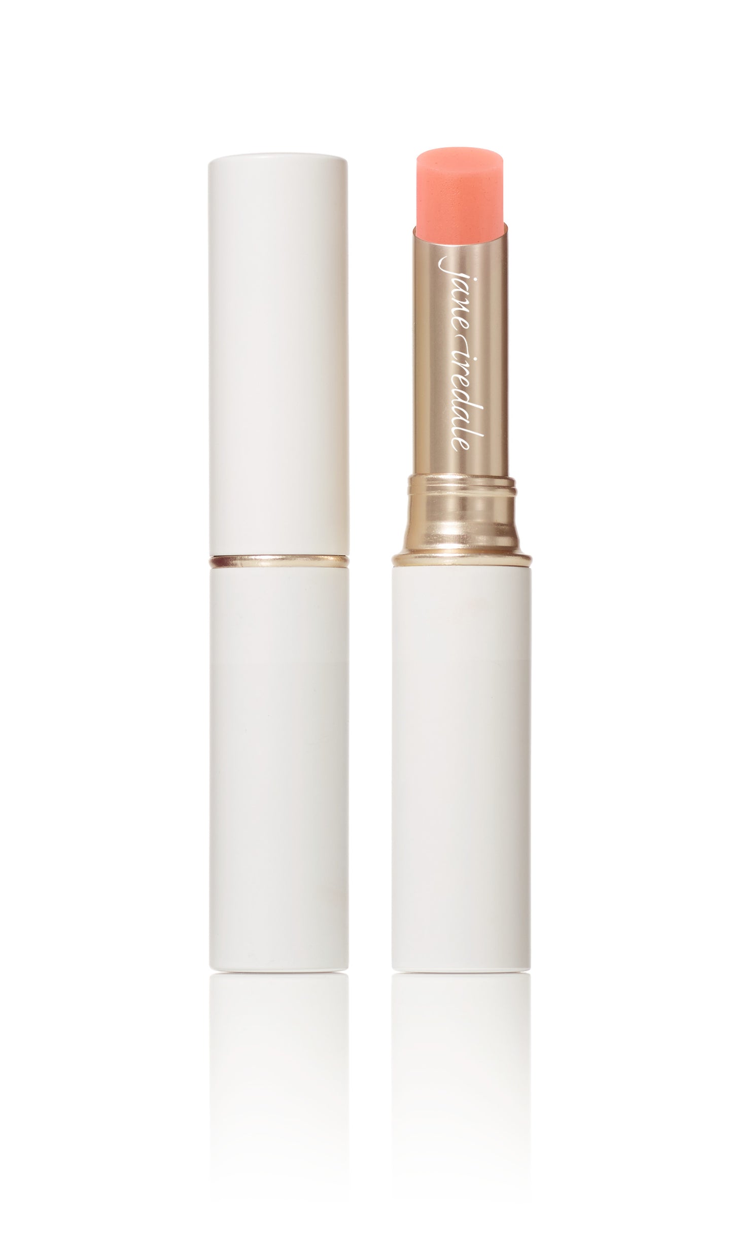 Just Kissed® Lip and Cheek Stain: white-and-gold tubes, one open showing coral cream stick, multitasking for personalized tint, infused with nourishing oils for lips and cheeks.