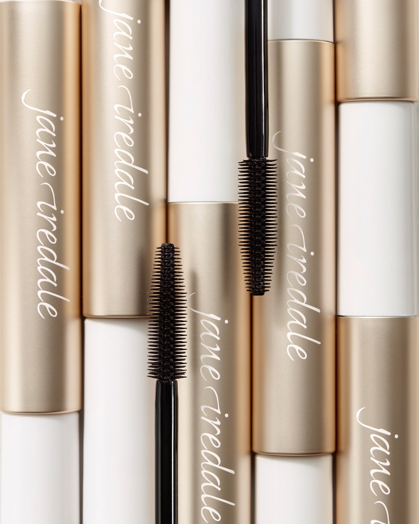 Lash Fixation Length & Definition Tubing Mascara tubes, with extended wands, showcase a formula for long, defined lashes, featuring easy removal and smudge-proof wear.
